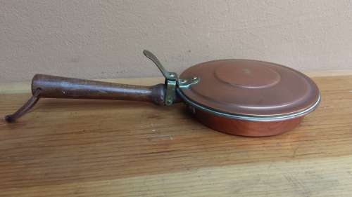 Stunning old copper nut roasting pan.
