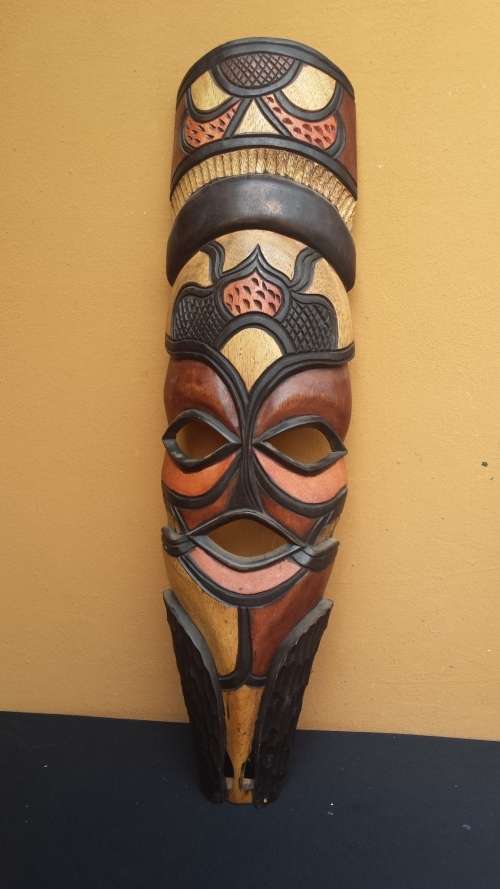 Pair of beautiful colourful wooden masks.