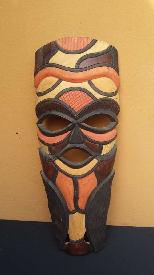 Pair of beautiful colourful wooden masks.