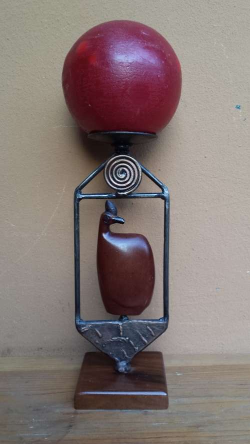 Stunning wooden bird candle holder.