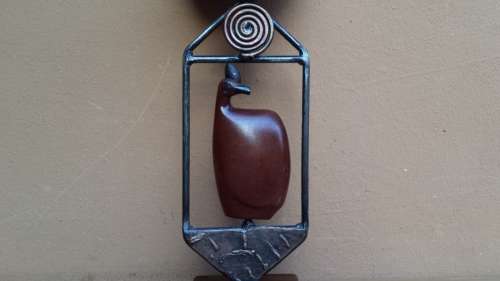 Stunning wooden bird candle holder.