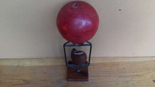 Stunning wooden bird candle holder.