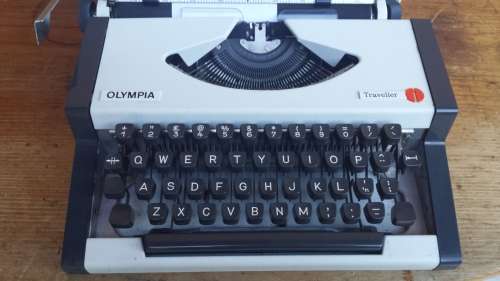 Portable Olympia typewriter.
