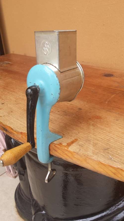 Old hand operated grater.