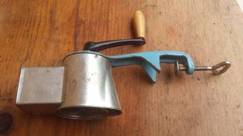 Old hand operated grater.