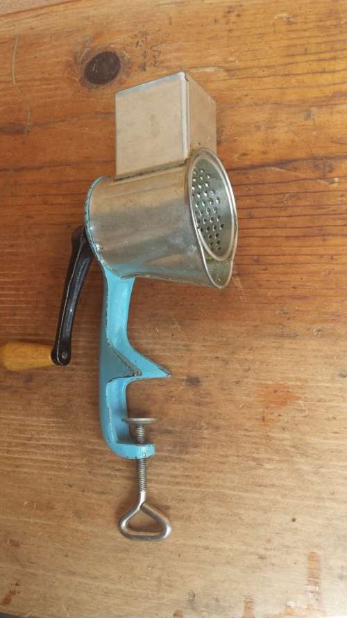 Old hand operated grater.