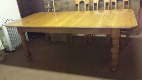 Large, old oak dining room table.