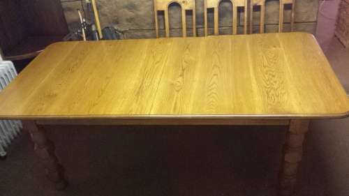 Large, old oak dining room table.