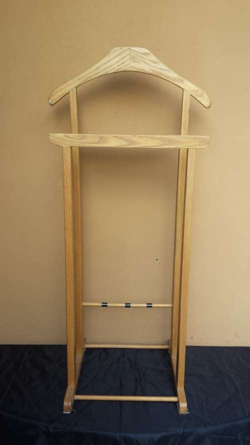 Lovely old wooden suit holder.