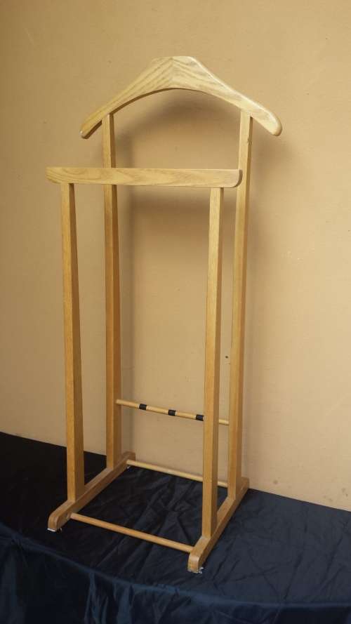 Lovely old wooden suit holder.