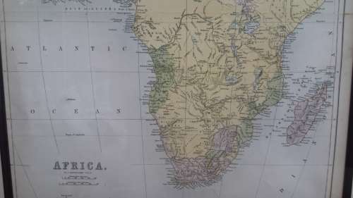 Framed 1876 Africa map by Bartholomew.