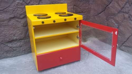 Beautiful kids play stove.