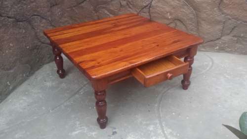 Beautiful square solid wood coffee table.