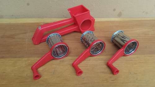 Lovely red plastic hand grater.
