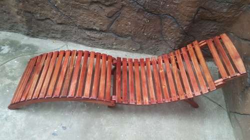 Beautiful pair of wooden garden loungers.