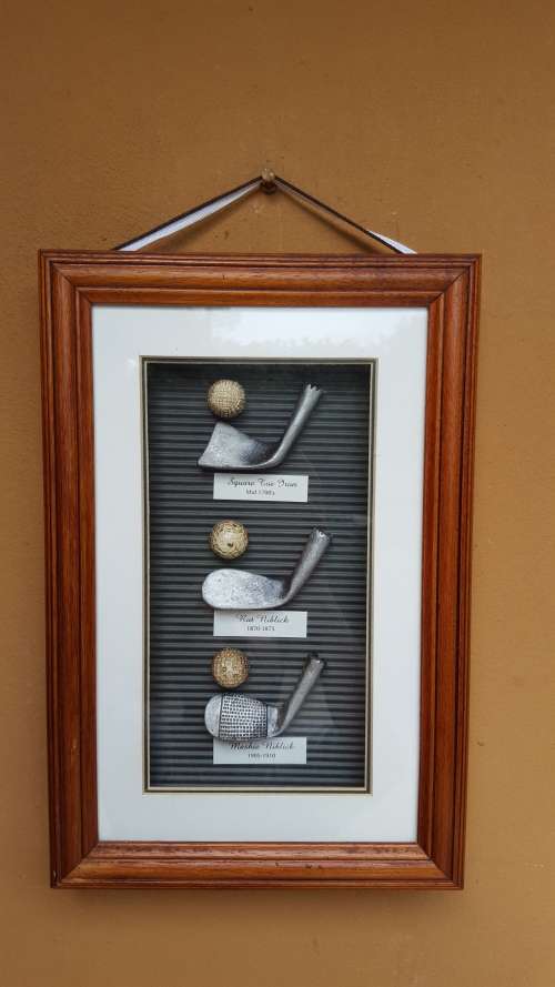 Awesome hanging golfing memorabilia.