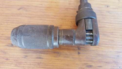 Old hand operated drill.