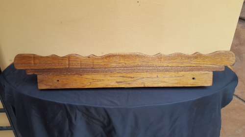 Old decorative wooden wall shelf.