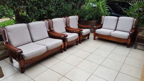 Beautiful wooden 6 seater lounge suite.