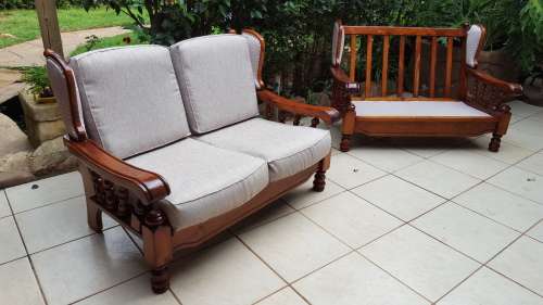 Beautiful wooden 6 seater lounge suite.