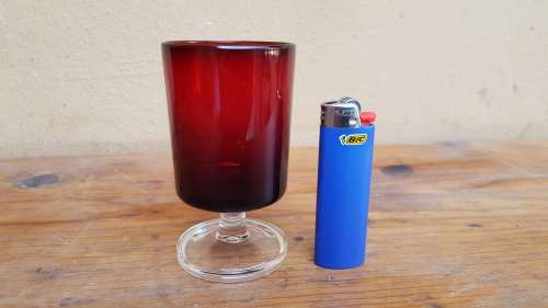 Set of 6 cranberry red sherry glasses.