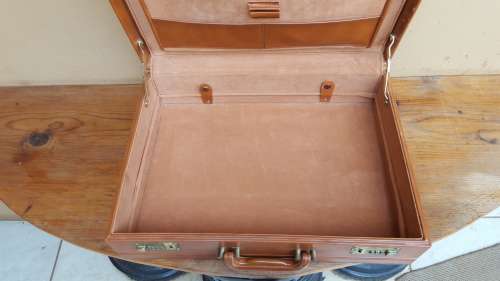 Lovely light brown briefcase.