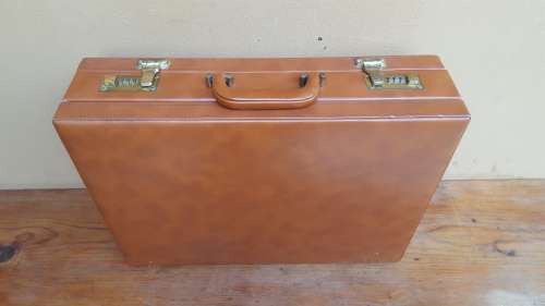 Lovely light brown briefcase.