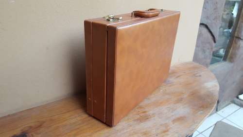 Lovely light brown briefcase.