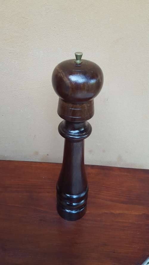 Beautiful solid imbuia wood pepper grinder.