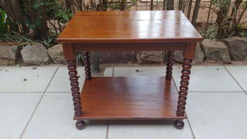 Beautiful old two tier bauble leg coffee table.