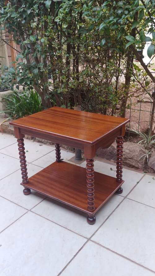 Beautiful old two tier bauble leg coffee table.