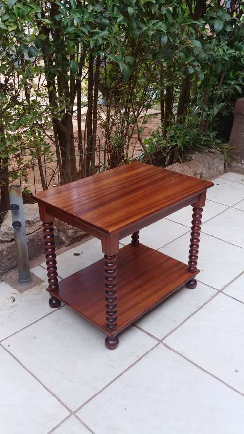 Beautiful old two tier bauble leg coffee table.