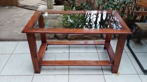 Lovely solid wood and glass coffee table.