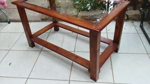 Lovely solid wood and glass coffee table.