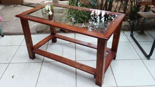 Lovely solid wood and glass coffee table.