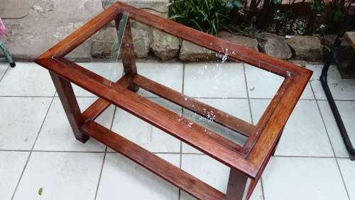 Lovely solid wood and glass coffee table.