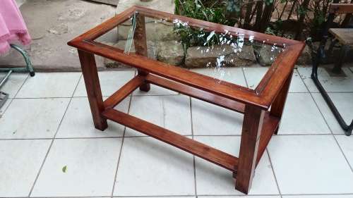 Lovely solid wood and glass coffee table.