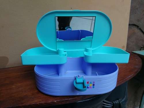 Lovely plastic jewellery box.