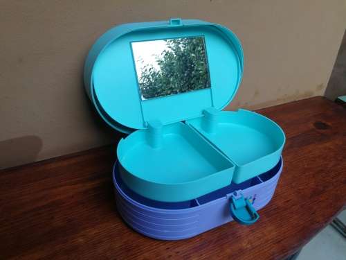 Lovely plastic jewellery box.