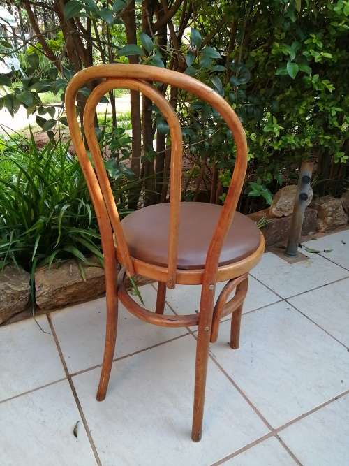 Beautiful old bentwood globe chair.