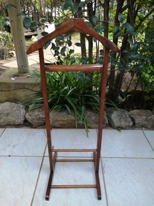 Solid wood jacket stand.