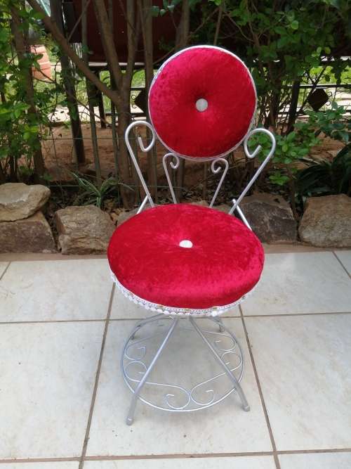 Beautiful, vintage metal bordeaux chair.