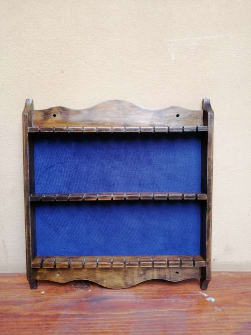 Beautiful, wooden antique teaspoon rack.