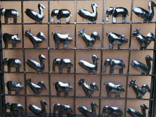 Beautiful, old metal birds and animals fire screen.