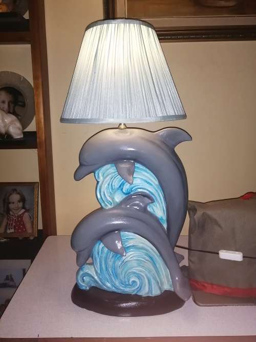 Beautiful large ceramic dolphin lamp.