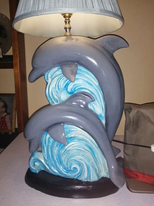 Beautiful large ceramic dolphin lamp.