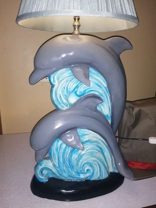 Beautiful large ceramic dolphin lamp.