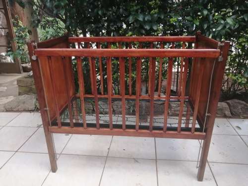 Lovely old solid wood cot.