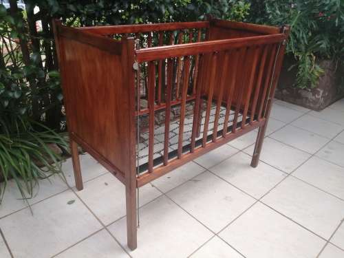 Lovely old solid wood cot.