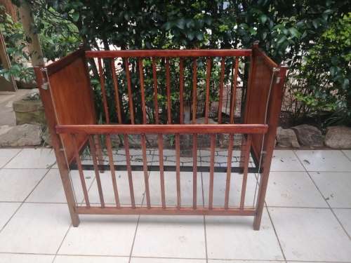 Lovely old solid wood cot.